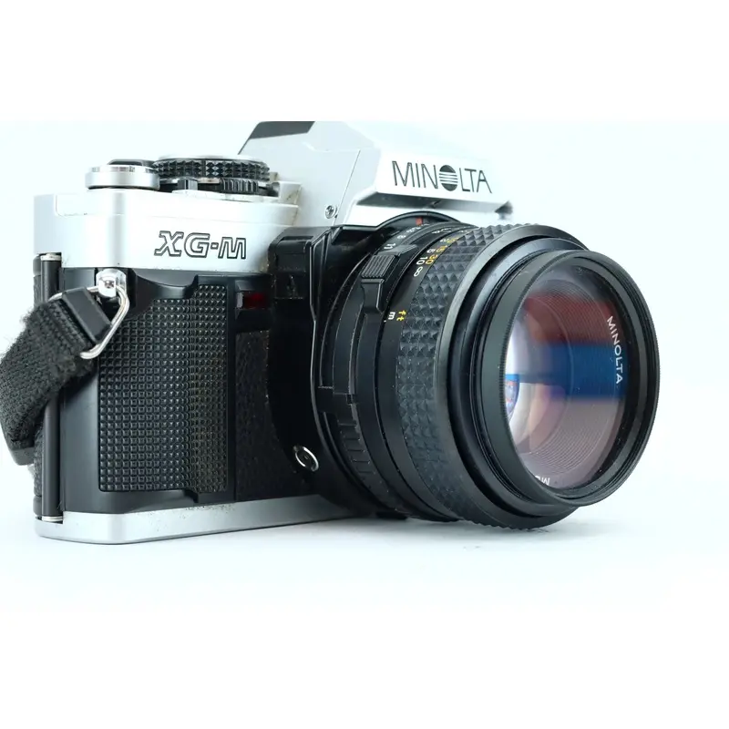 Minolta XG-M + Minolta MD 50mm f/1.7 (SN: 8390490)