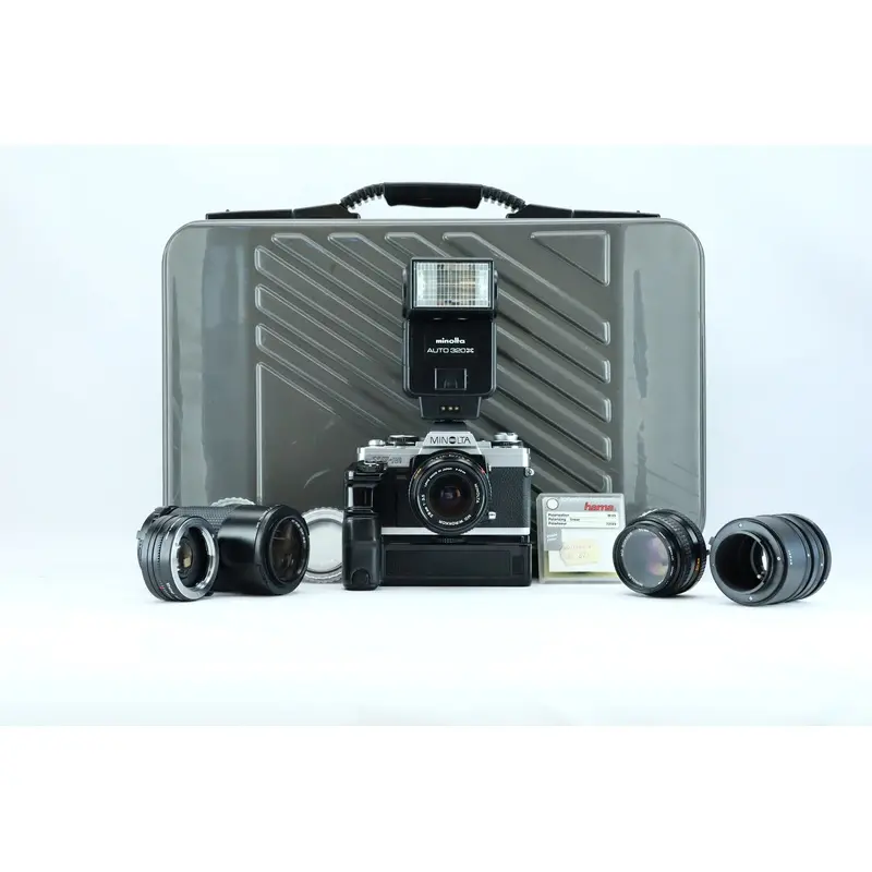 Minolta XG-M Set  28mm, 50mm, 75150mm + Grip + Teleconverter