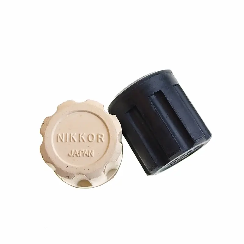 Nikonos rubber aperture/focusing knob covers.