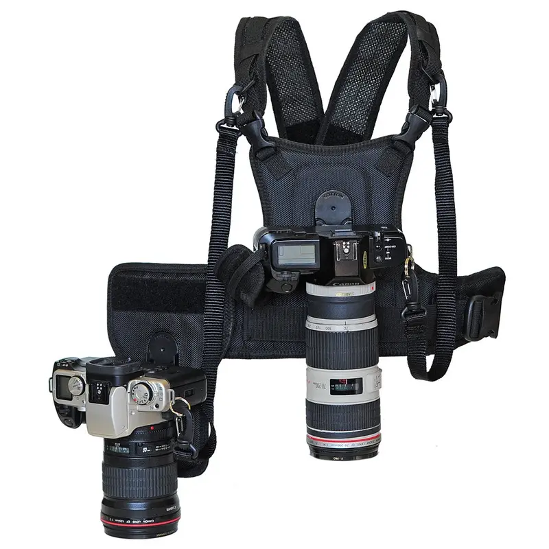 Cotton Carrier vest & holster system for two cameras.
